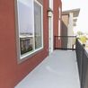 Private balcony with railing and city views