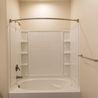 Bathroom with tub and shower combo